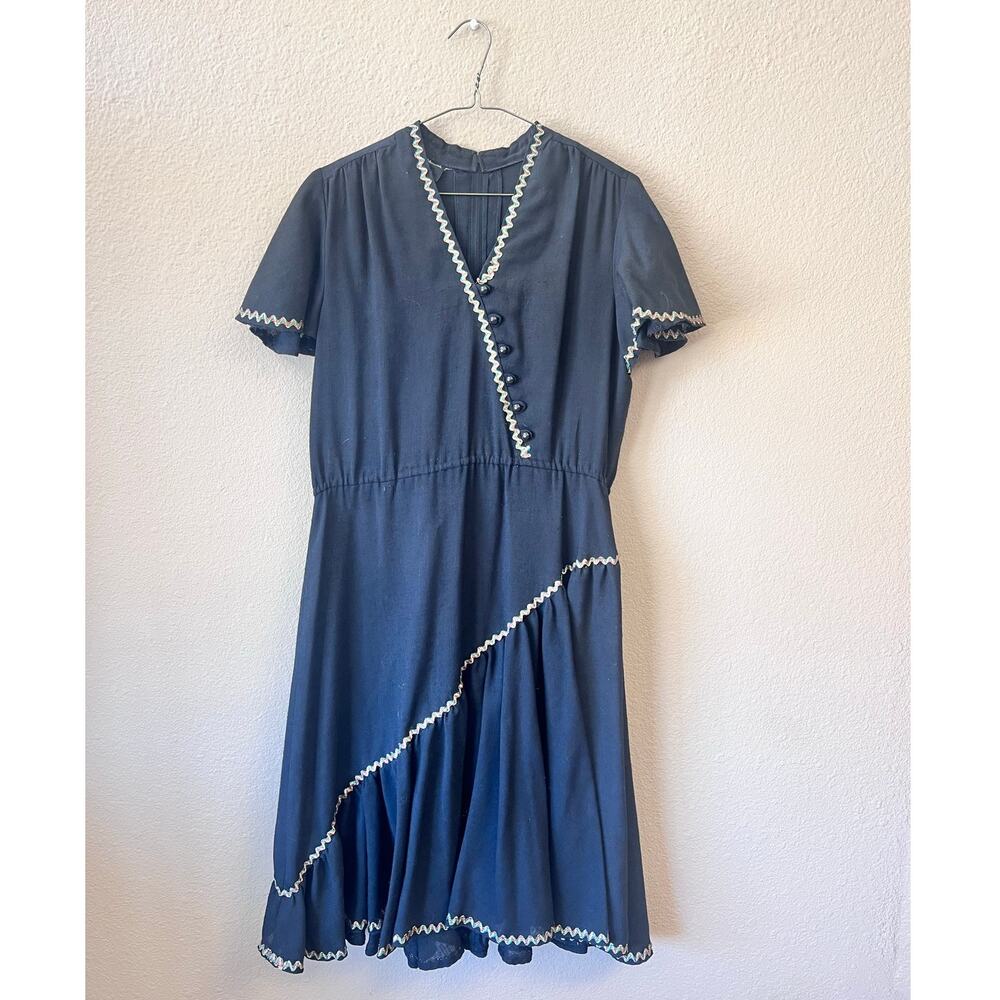 Vintage Herman Marcus black short sleeve dress size M
